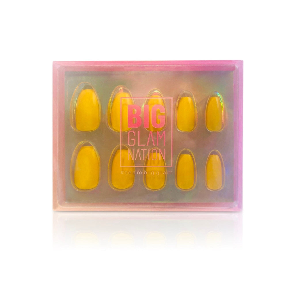 Press on nails in Big Glam Nation's honeycombs shown in branded packaging.