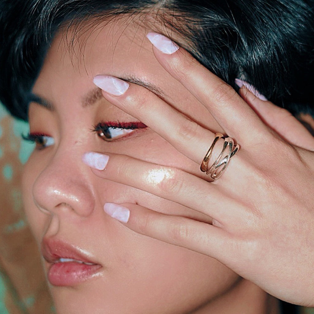 Press on nails in Big Glam Nation's Pink Cosmos worn in lifestyle setting.