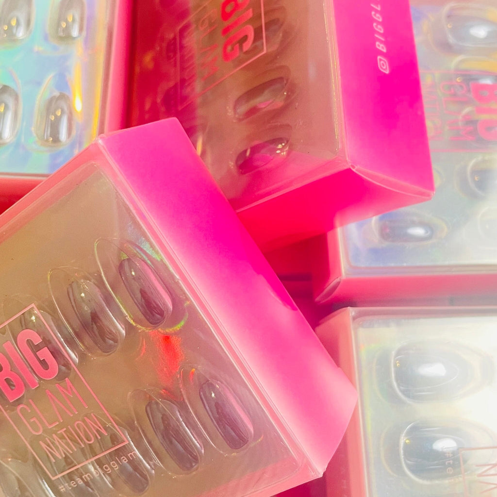 Press on nails in Big Glam Nation's Mini Magnetos photographed in their shipment packaging.