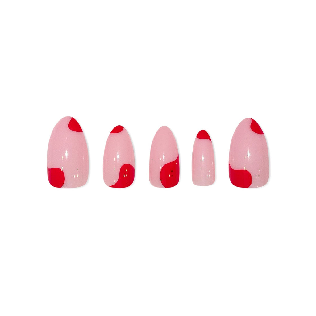 Big Glam Nation press on nails are laid on a white background.