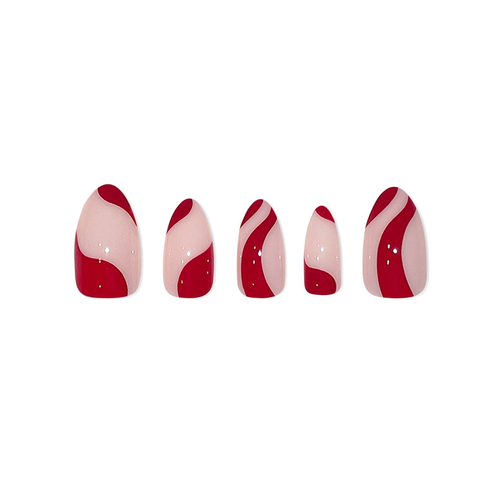 Big Glam Nation false nails are laid against white background