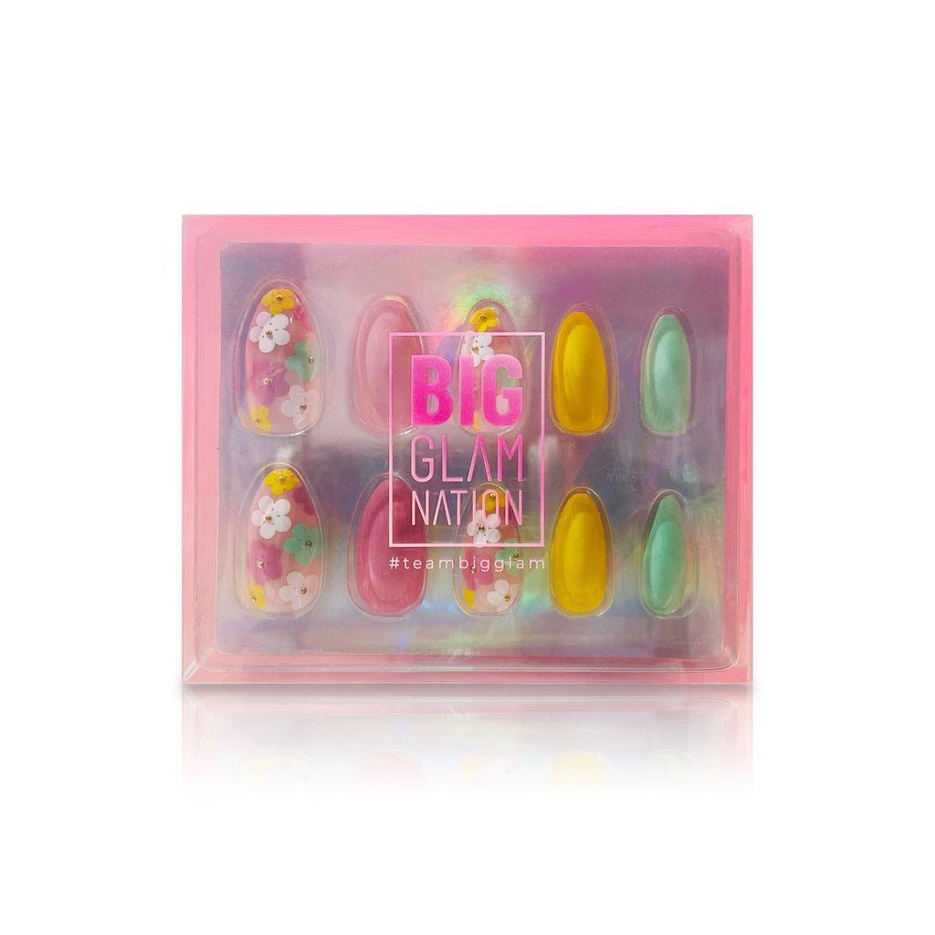 Big Glam Nation press on nails are shown in their branded packaging against a white background.