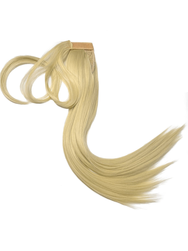 The Big Glam Nation Sleek Ponytail is laid flat against a white background in the color Bleached Blonde. Length and shine of the extensions are highlighted.