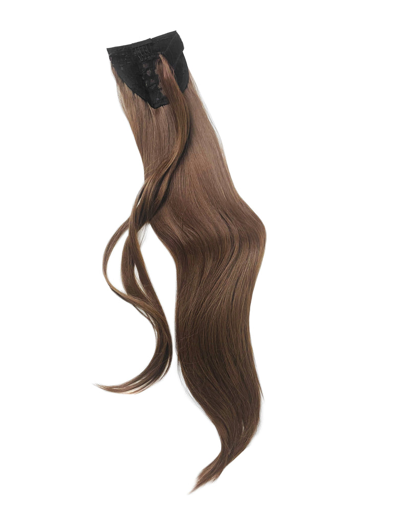 The Big Glam Nation Sleek Ponytail is laid flat against a white background in the color Milk Chocolate. Length and shine of the extensions are highlighted.